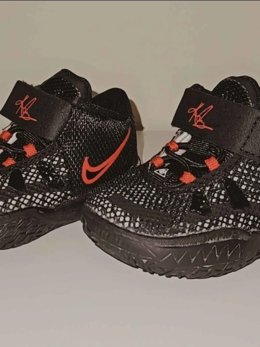 Nike Kids Black Sneakers with Red Accents